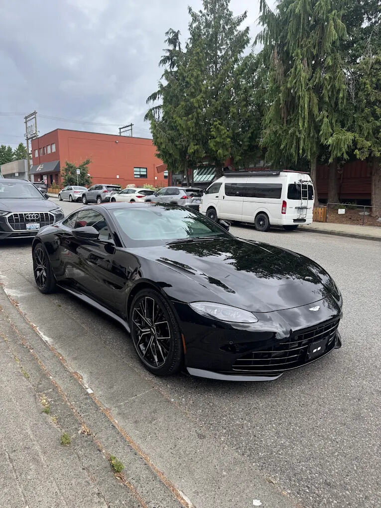 Aston Martin Vantage after full exterior detail, deep black finish